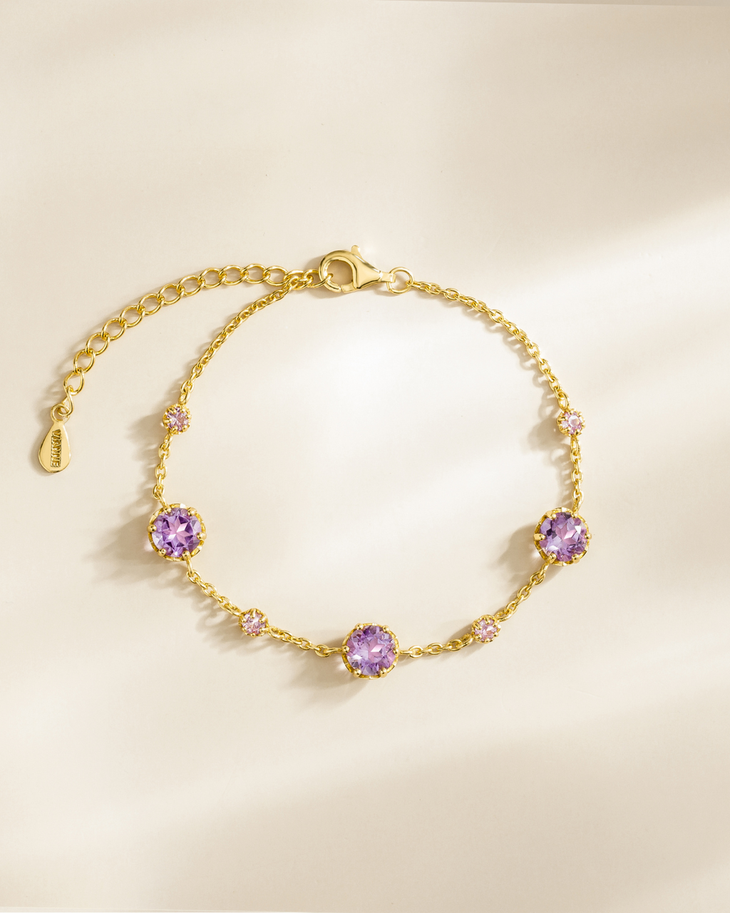Bracelet en vermeil or 18 carats avec saphir rose et améthyste